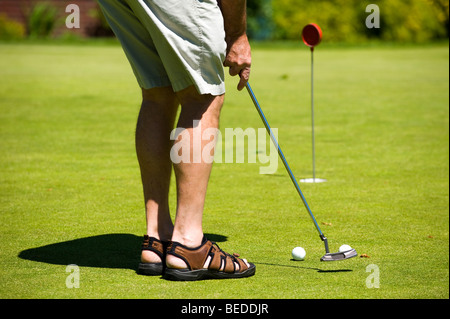 golfer putting Stock Photo