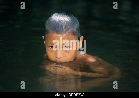 Young Choco Indian Boy, bathing in river, Darien Jungle, Panama Stock Photo