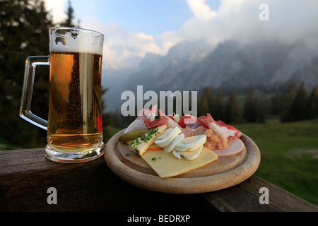 Hearty snack with beer, Salzkammergut, Upper Austria, Austria, Europe Stock Photo