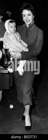 Actress Elizabeth Taylor walking with her baby Stock Photo