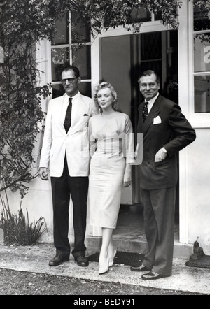 Marilyn Monroe with husband Arthur Miller and friend Laurence Olivier Stock Photo