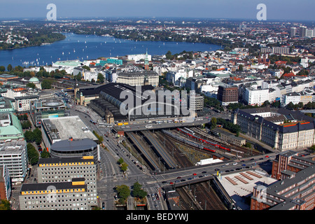 City overview of downtown Hamburg with main train station, center, and sailing boats on the Alster lake, rear, district of St.  Stock Photo