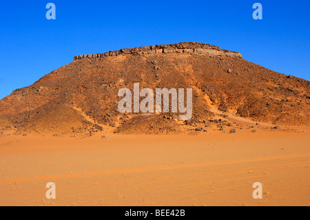 Heavily eroded rock hill in the Sahara, Libya, Africa Stock Photo