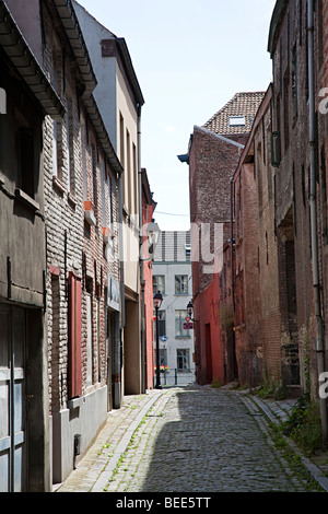 Narrow street in the medieval quarter the Patershol Ghent Belgium Stock Photo
