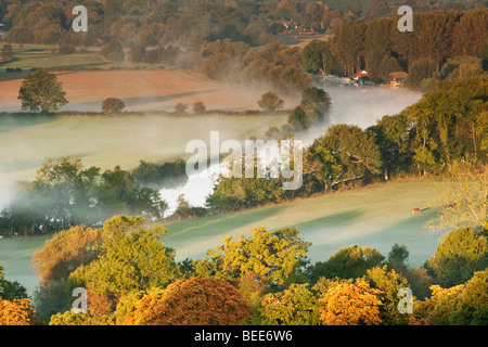 Autumn dawn over the River Thames looking upstream from an elevated position near Mapledurham, Berkshire, Uk Stock Photo