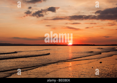 Sun setting over the English coast in October 2009 Stock Photo