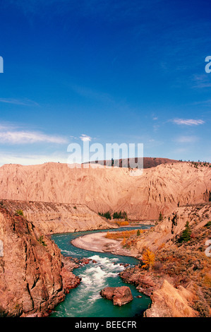 Chilcotin River flowing through Farwell Canyon, Cariboo Chilcotin Region, BC, British Columbia, Canada - Autumn / Fall Landscape Stock Photo