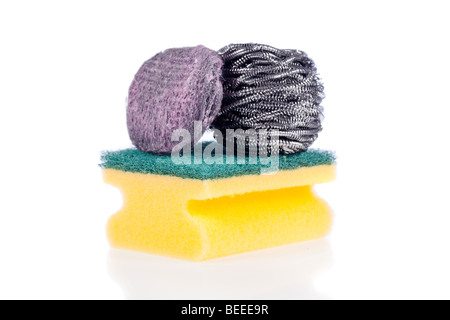 A Scouring Pad Sponge, a Steel Wool Soap Pad and a Stainless Steel Pad isolated on a white background Stock Photo