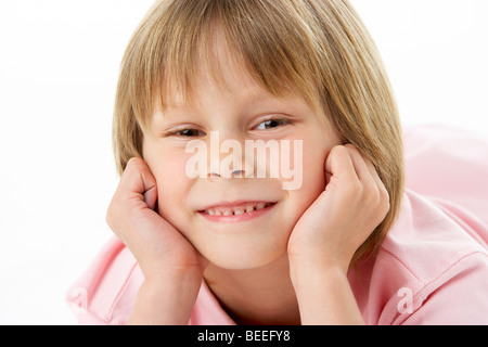 Studio Portrait of Smiling Boy Stock Photo