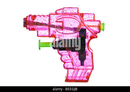 Pink transparent plastic water pistol isolated on a white background Stock Photo