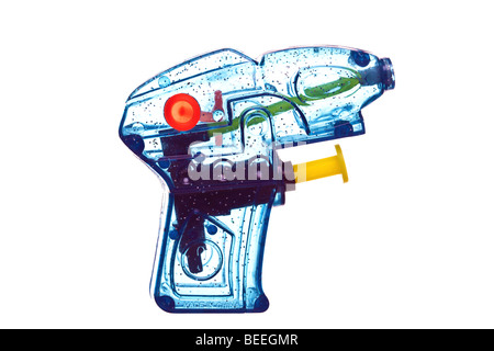 Blue transparent plastic water pistol isolated on a white background. Stock Photo