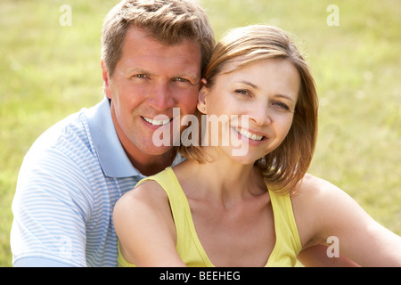 Middle aged couple having fun in countryside Stock Photo