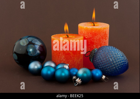 Christmas candles and decoration with brown background Stock Photo