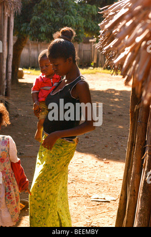 Madagascar - Woman and child pictured in the late afternoon sunlight in Ebakika Village. Stock Photo