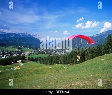 Paragliding near the village near the alpine village of Seefeld Stock Photo