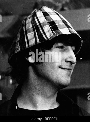 Beatles singer John Lennon wearing plaid hat Stock Photo