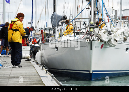 Racing crews at Cowes Yacht Haven, Cowes Week 2009, Isle of Wight, England, UK Stock Photo