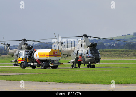 Two Royal Air Force (RAF) Puma Helicopters refueling Airport ,Shoreham by Sea Stock Photo