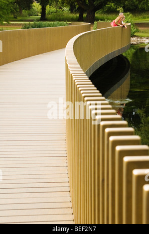 View of the Sackler Crossing over The Lake in Kew Gardens. Stock Photo