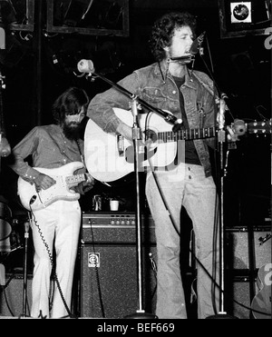 Musicians Bob Dylan and George Harrison in benefit Stock Photo