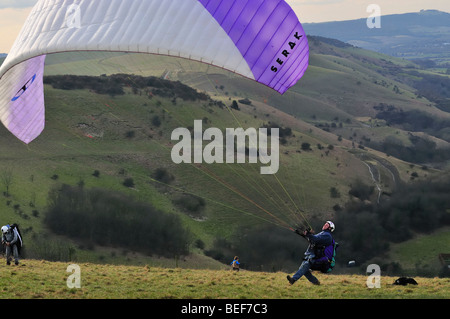Male Para glider landing.Devils Dyke East Sussex Stock Photo