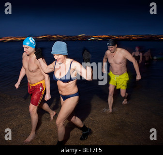 Sea Swimming during Winter Festival, Nautholsvik, Reykjavik, Iceland Stock Photo