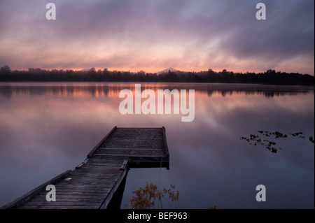 Lake Cassidy sunrise in fog with Mount Pilchuck Stock Photo