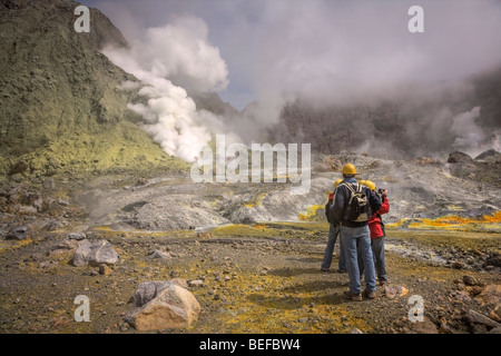 Tourists on White Island, Bay of Plenty, New Zealand Stock Photo