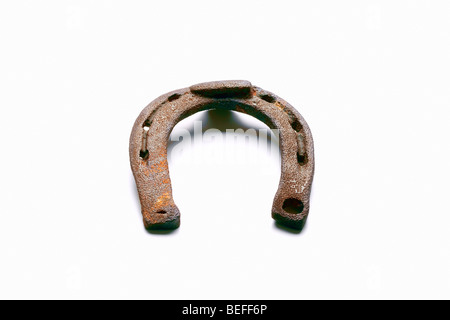 old rusty horseshoe isolated on white background - clipping path Stock Photo
