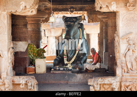 A man praying in Hindu temple Stock Photo