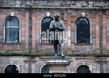 Statue of the radical and liberal statesman Richard Cobden against St Ann's Church, Manchester, England, UK Stock Photo