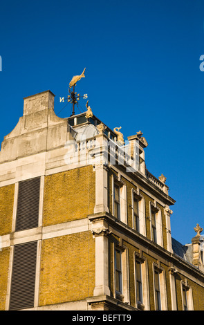Exterior detail of The Old Billingsgate Fish Market, now offices and entertainment venue. London. UK. Late afternoon sun. Stock Photo