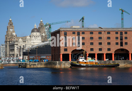 historic warehouses in the basin area at the albert dock liverpool merseyside england uk Stock Photo