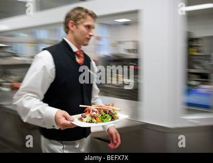 Steward in the kitchen of Hotel ADLON in Berlin Stock Photo