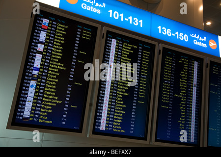 Flight information screen departures board dubai Stock Photo