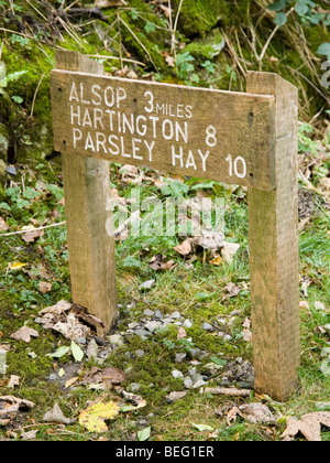 A wooden route marker on the Tissington Trail, Derbyshire England UK Stock Photo