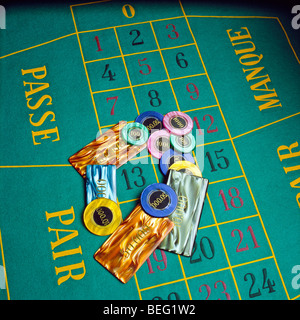 Gambling chips on roulette table Stock Photo