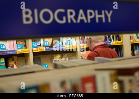 WH Smiths biographical literature on sale in departures shopping area of Heathrow airport's Terminal 5. Stock Photo