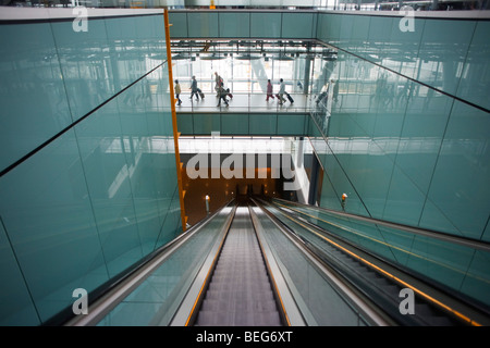 Arriving passenger, escalator and airport architecture at international ...