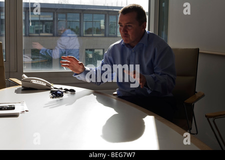 British Airways' Chairman, Willie Walsh during an interview by Alain de Botton at the company's Waterside corporate HQ Stock Photo