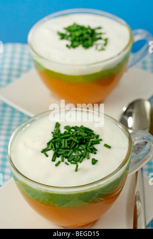 Pumpkin soup and peas cream. Recipe available. Stock Photo