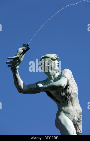Detail of the Brabo Fountain showing Silvius Brabo throwing giant Druon`s hand. Stock Photo