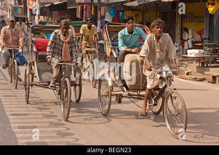 Busy roads full of cycle rickshawas at Godolia in Varanasi city, India Stock Photo