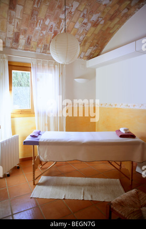 Nice massage room with barrel vault on clay bricks, Mediterranean interior house Stock Photo