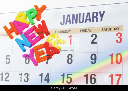 Alphabets Happy New Year and calendar page showing month of January Stock Photo