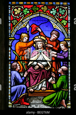 A stained glass window by William Warrington depicting Christ crowned with thorns, Church of St Mary the Virgin, Gunthorpe, Norfolk Stock Photo