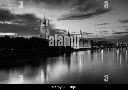 Palace of Westminster at night in black and white. As viewed from Lambeth Bridge over the Thames River, London. Stock Photo