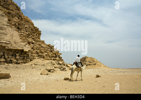 Police on Camel at Bent Pyramid of Pharaoh Snofru, Dahshur, Egypt Stock Photo