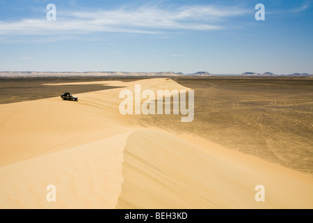 Jeep on Sand Dune, Libyan Desert, Egypt Stock Photo