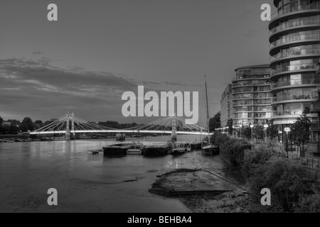View of the Albion Riverside and Albert Bridge from Battersea Bridge in London, England. Stock Photo